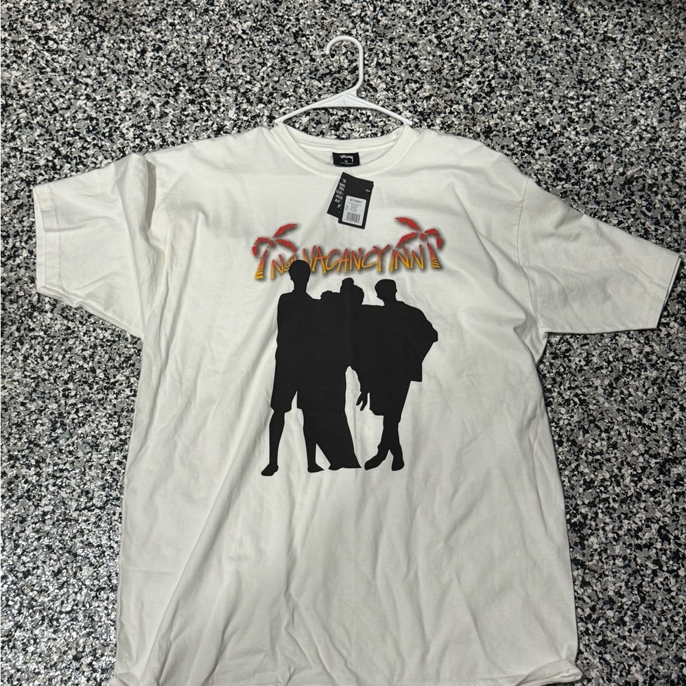 Stussy DS White Graphic Tee with Black Silhouette Design